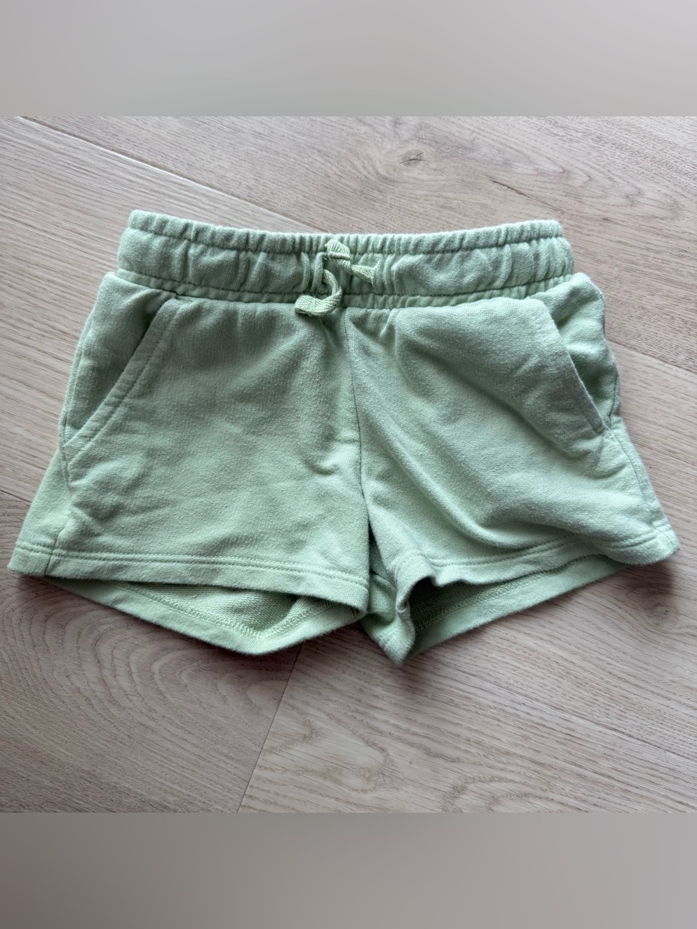 Green sweat shorts